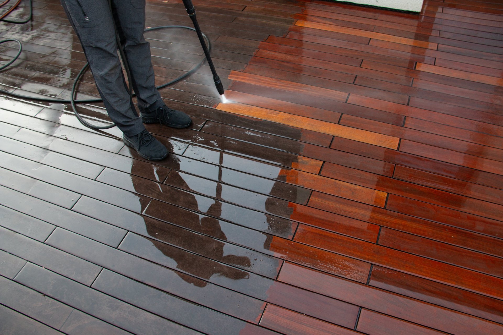 Cleaning terrace with a power washer